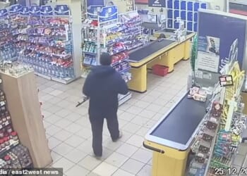 Footage shows the astonishing moment a man armed with an AK-47 assault rifle began shooting in a Ukrainian supermarket