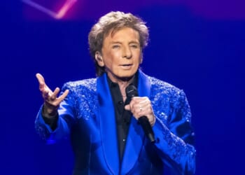 Barry Manilow, 82, reveals cancer diagnosis and will undergo surgery to ‘remove part of lung’ as he postpones concerts