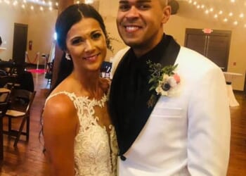 Christina Chambers, 38, and her husband Johnny Rimes, 41, (pictured together on their wedding day in 2021) were both found unresponsive with gunshot wounds at their home in Hoover, Alabama on Tuesday morning