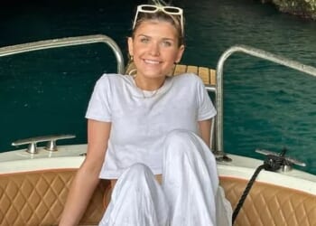 Kayla Corrigan, 21, (pictured in Spain earlier this year) was killed when her family home in Needham, a suburb of Boston, erupted into flames last week. Two other adults who were inside the residence at the time of the fire managed to escape unharmed