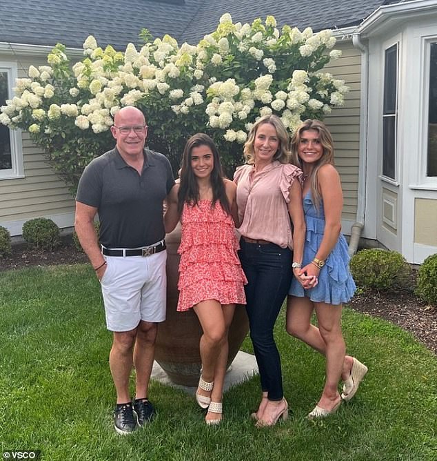 Kayla Corrigan (right) is pictured with her father James (left), sister Alyssa (second left) and step-mother Jennifer (second right)