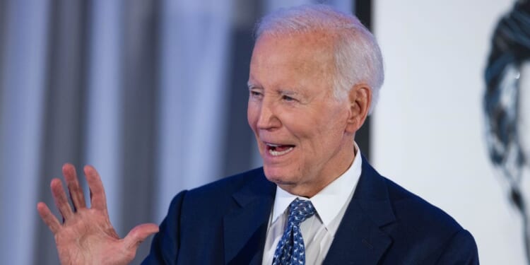 Former President Joe Biden delivers remarks during the Edward Kennedy Institute's 10th anniversary celebration at the Edward Kennedy Institute on Oct. 26, 2025, in Boston, Massachusetts.