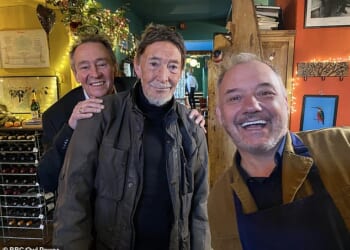 Comedian Bob Mortimer has paid tribute to 'brilliant, funny giant of a bloke' Chris Rea as he recalled his legendary 'egg in a bath' story to the delight of fans (Seen together in 2020)