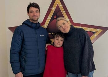 Louis Tremblay, nine, (centre, pictured with dad Adam, left, and mum Lauren, right) was left distraught after a rogue delivery driver threw his Christmas present in the bin