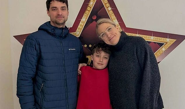 Louis Tremblay, nine, (centre, pictured with dad Adam, left, and mum Lauren, right) was left distraught after a rogue delivery driver threw his Christmas present in the bin