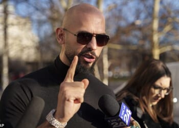 Research shows four out of ten young men hold a positive view of sexist commentators such as Andrew Tate, pictured outside the Bucharest Tribunal in Romania