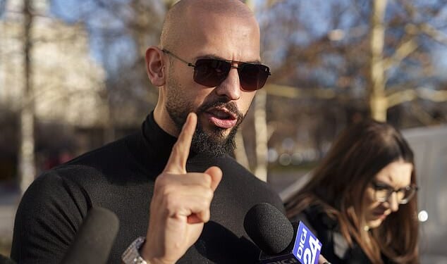 Research shows four out of ten young men hold a positive view of sexist commentators such as Andrew Tate, pictured outside the Bucharest Tribunal in Romania
