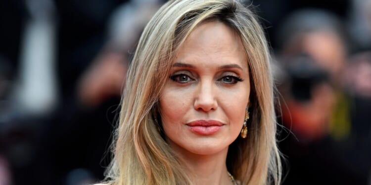 Brave Angelina Jolie reveals mastectomy scars in photoshoot as she aims to raise cancer awareness 12 years after surgery