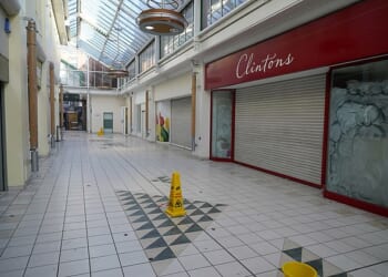 Pictured: Closed up shops and completely empty hallways at Riverside Shopping Centre