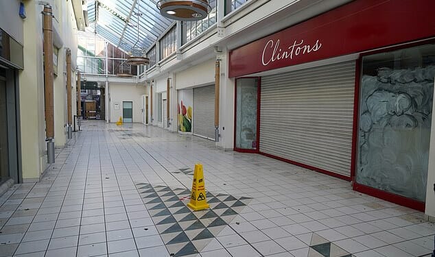 Pictured: Closed up shops and completely empty hallways at Riverside Shopping Centre