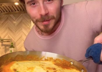 Brooklyn Beckham, 26, appeared to be missing British cooking as he whipped up a traditional Shepherd's pie in his LA kitchen on Thursday