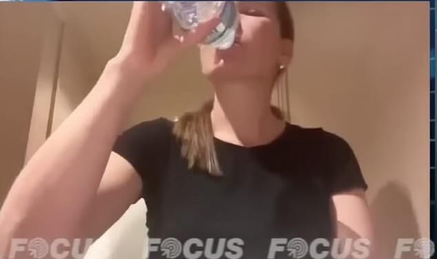 Zulma Guzman Castro drinks from a bottle of Buxton mineral water during an exclusive interview with Focus Noticias