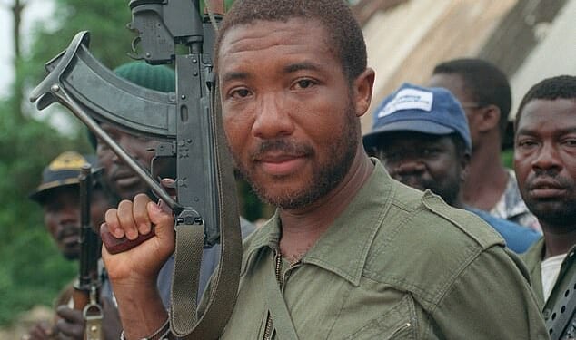 Charles Taylor in his days as a rebel leader in May 1990. Liberia still carries deep scars from the atrocities that were committed by fighters loyal to him and Doe