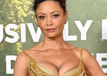 Thandiwe Newton, 53, showed off her collection of tattoos at the world premiere of Anaconda, in Los Angeles which included a heart on her chest, a smiley face, and two quotes on her arms