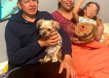Pablo Criollo, 45, was killed after being shot by an arrow on Saturday while walking home from work. He was pictured with Paula Amez, his wife, and his daughter