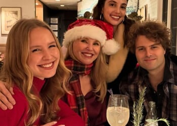 Christie Brinkley shared a rare family photo to Instagram with all three of her children this week. They were huddled together at home during a Christmas celebration