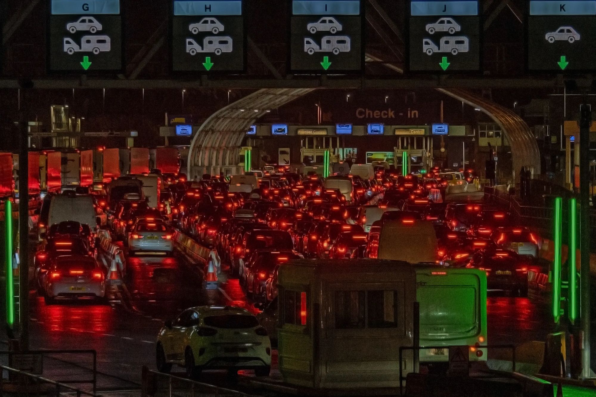 An image collage containing 1 images, Image 1 shows Traffic at the Port of Dover with long lines of cars and lorries waiting at border control