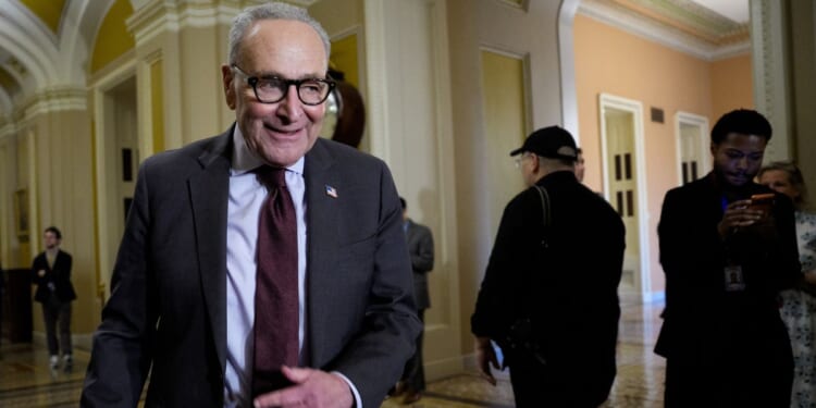 Senate Minority Leader Chuck Schumer arrives to speak to reporters following a Democratic policy luncheon at the U.S. Capitol Building on Dec. 2, 2025, in Washington, D.C.