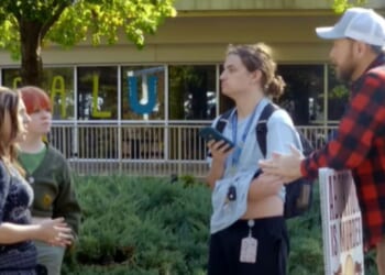 Christian anti-abortion activist T. Russell Hunter engages with college students in a video posted on Dec. 1, 2025.