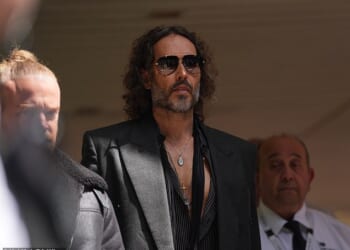 Russell Brand pictured leaving Southwark Crown Court in May after he pleaded not guilty to five charges relating to alleged sex attacks on four women