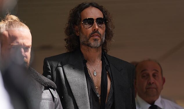 Russell Brand pictured leaving Southwark Crown Court in May after he pleaded not guilty to five charges relating to alleged sex attacks on four women