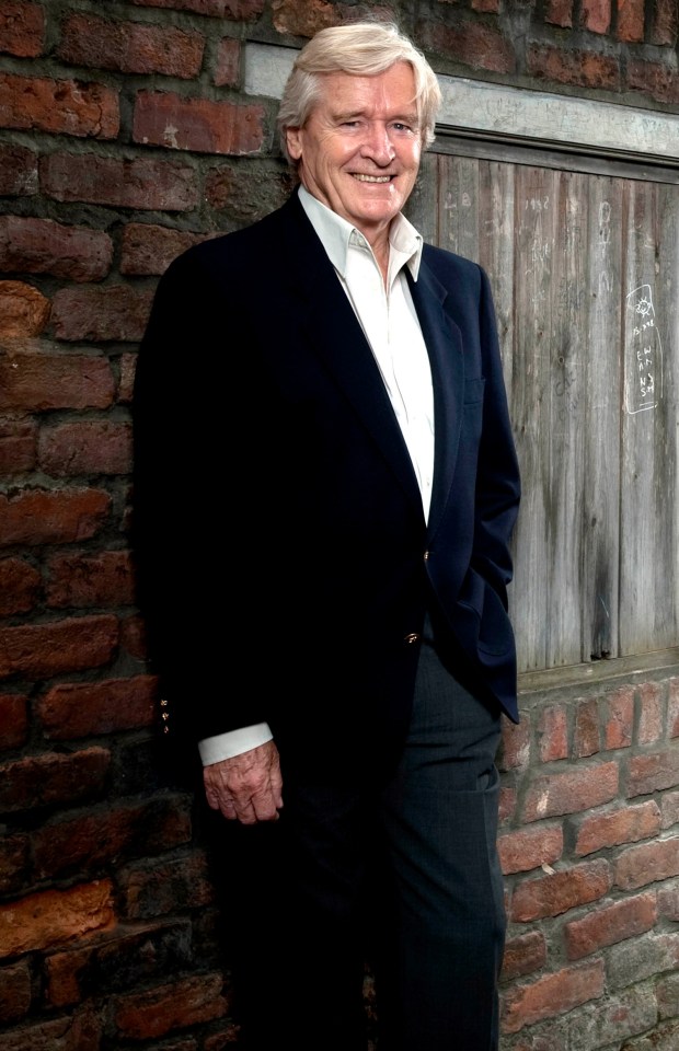 William Roache playing Ken Barlow from Coronation Street.