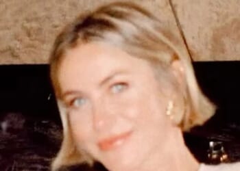 DWTS host Julianne Hough strips down to G-string and black bra as she poses in front of family’s Christmas tree