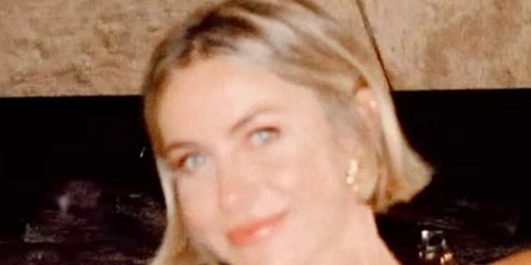 DWTS host Julianne Hough strips down to G-string and black bra as she poses in front of family’s Christmas tree