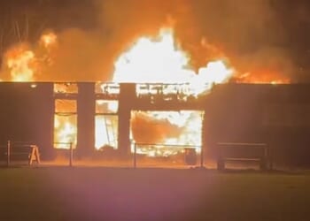 'Devastating' blaze rips through historic rugby club's stadium destroying clubhouse as multiple crews battle inferno