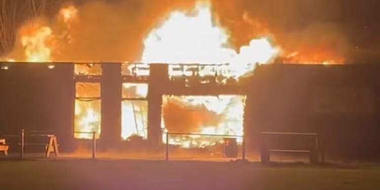 'Devastating' blaze rips through historic rugby club's stadium destroying clubhouse as multiple crews battle inferno