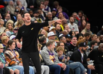 Head coach JJ Redick of the Los Angeles Lakers yells to his team during the second half of a game against the Utah Jazz at Delta Center on Dec. 18, 2025, in Salt Lake City, Utah.