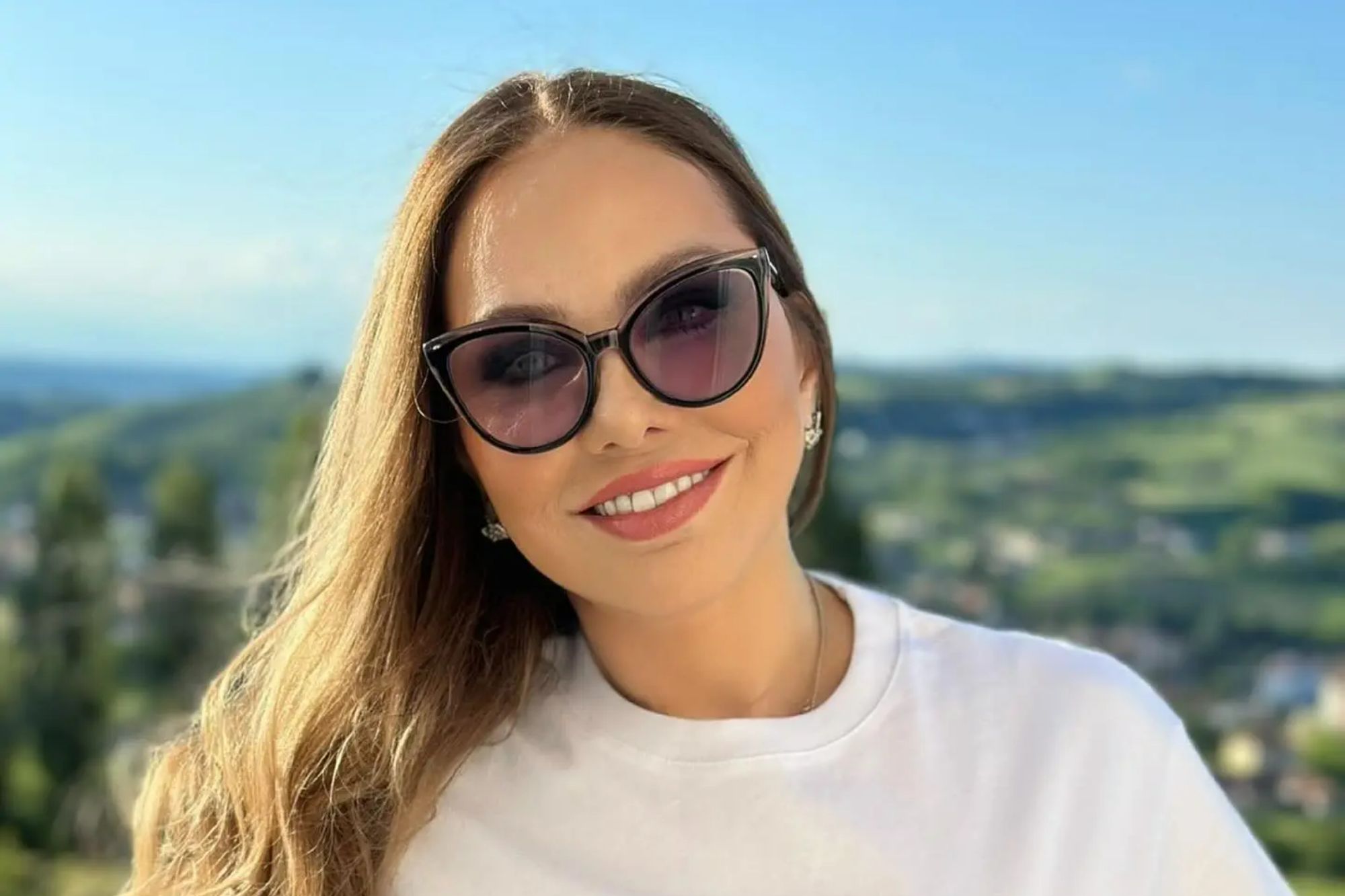 An image collage containing 1 images, Image 1 shows Ornella Muti, actress who played Princess Aura, wearing a white t-shirt with a nun holding cannabis