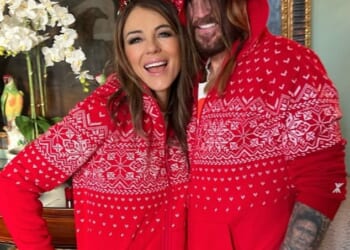 Elizabeth Hurley and Billy Ray Cyrus got into the holiday spirit - and matching onesies - as they spent their first Christmas together