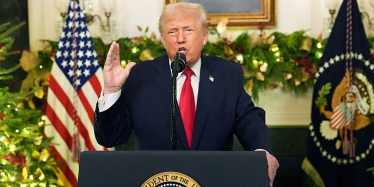President Donald Trump addresses the nation Wednesday from the Diplomatic Reception Room of the White House in Washington, D.C.