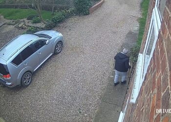CCTV footage shows the courier driver walking away with the parcel moments after he appeared to have confirmed delivery on a hand held device. Homeowner Steve Beresford, 61, said notification of the delivery appeared on his wife's mobile