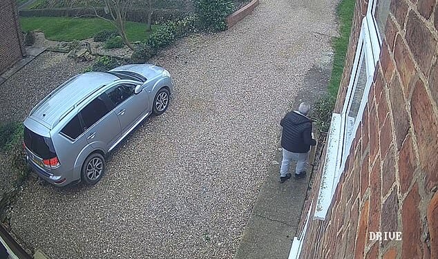 CCTV footage shows the courier driver walking away with the parcel moments after he appeared to have confirmed delivery on a hand held device. Homeowner Steve Beresford, 61, said notification of the delivery appeared on his wife's mobile