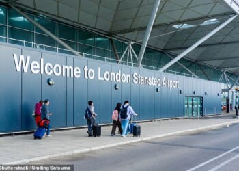 A former England and Premier League footballer has been arrested at Stansted Airport (pictured) on suspicion of attempted rape
