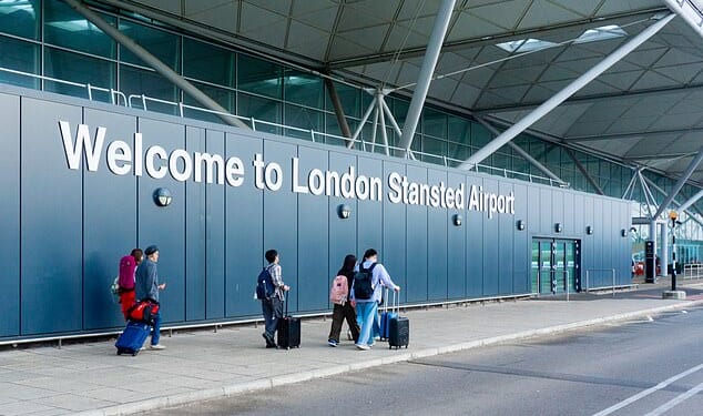 A former England and Premier League footballer has been arrested at Stansted Airport (pictured) on suspicion of attempted rape