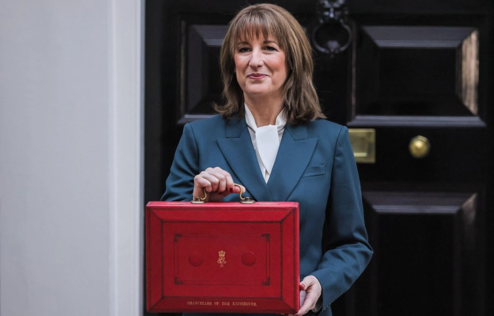 Rachel Reeves, Chancellor of the Exchequer, holding the red budget box outside 11 Downing Street.