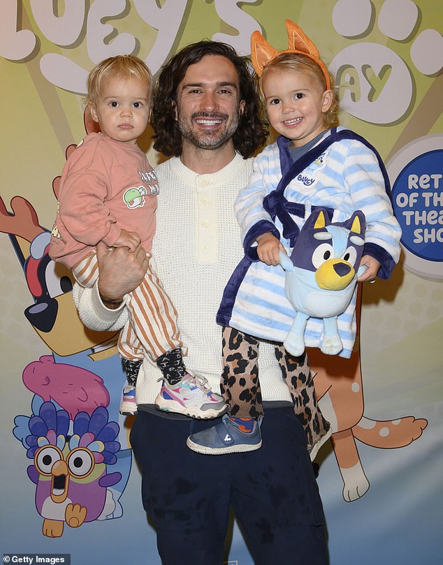 Joe Wicks with two of his four children