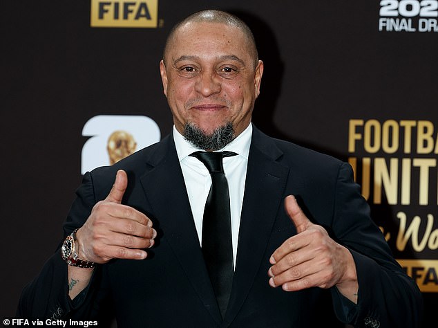 Roberto Carlos is pictured at the World Cup draw earlier this month in Washington DC