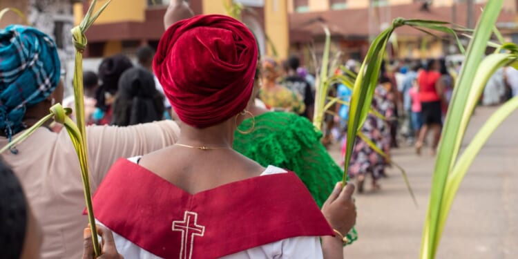 Members of St. Mary Cathedral celebrate Palm Sunday in Ibadan, Oyo, Nigeria on March 24, 2024.