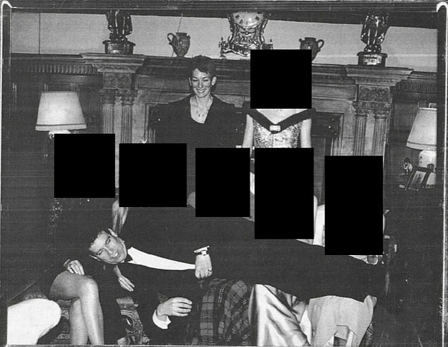The former Prince Andrew pictured lying across five women. The context of the photograph remains unknown (Maxwell pictured back row, left)