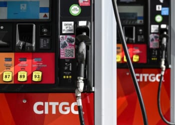 Gas pumps are seen at a CITGO gas station in Houston, Texas, on Dec. 2, 2025.