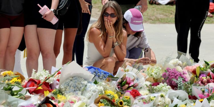 Mourners gather at a tribute to the victims of the Bondi Beach shooting that took place earlier in Sydney, Australia on Dec. 15, 2025.