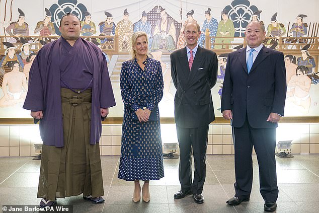 The Duke and Duchess of Edinburgh meet wrestler Asanoyama Hiroki (left) before attending the sumo wrestling at Ryogoku Kokugikan National Sumo Arena in Tokyo on  September 19