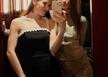 The toxic family feud currently overshadowing Holly Ramsay's imminent wedding to Adam Peaty was brushed aside on Monday evening as they dined with friends out at her father's Mayfair restaurant