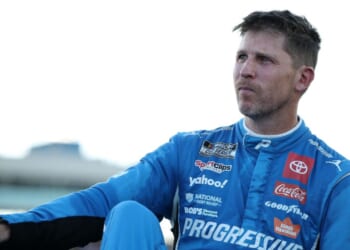 Denny Hamlin, driver of the Progressive Toyota, exits his car after the NASCAR Cup Series Championship at Phoenix Raceway on Nov. 2, 2025, in Avondale, Arizona.