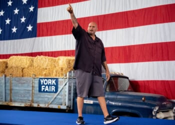 Sen. John Fetterman, a Pennsylvania Democrat, seen at an October 2024 rally for then-vice presidential nominee Minnesota Gov. Tim Walz, has frequently emerged as a voice of reason amid the increasingly contentious division between Democrats and Republicans