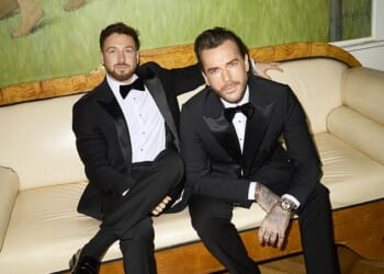Sam Thompson, left, and Pete Wicks wear suits and shirts from Reiss, accessorizing with bow ties from Next. Sam wears shoes from Bobbies while Pete wears a pair from Asos